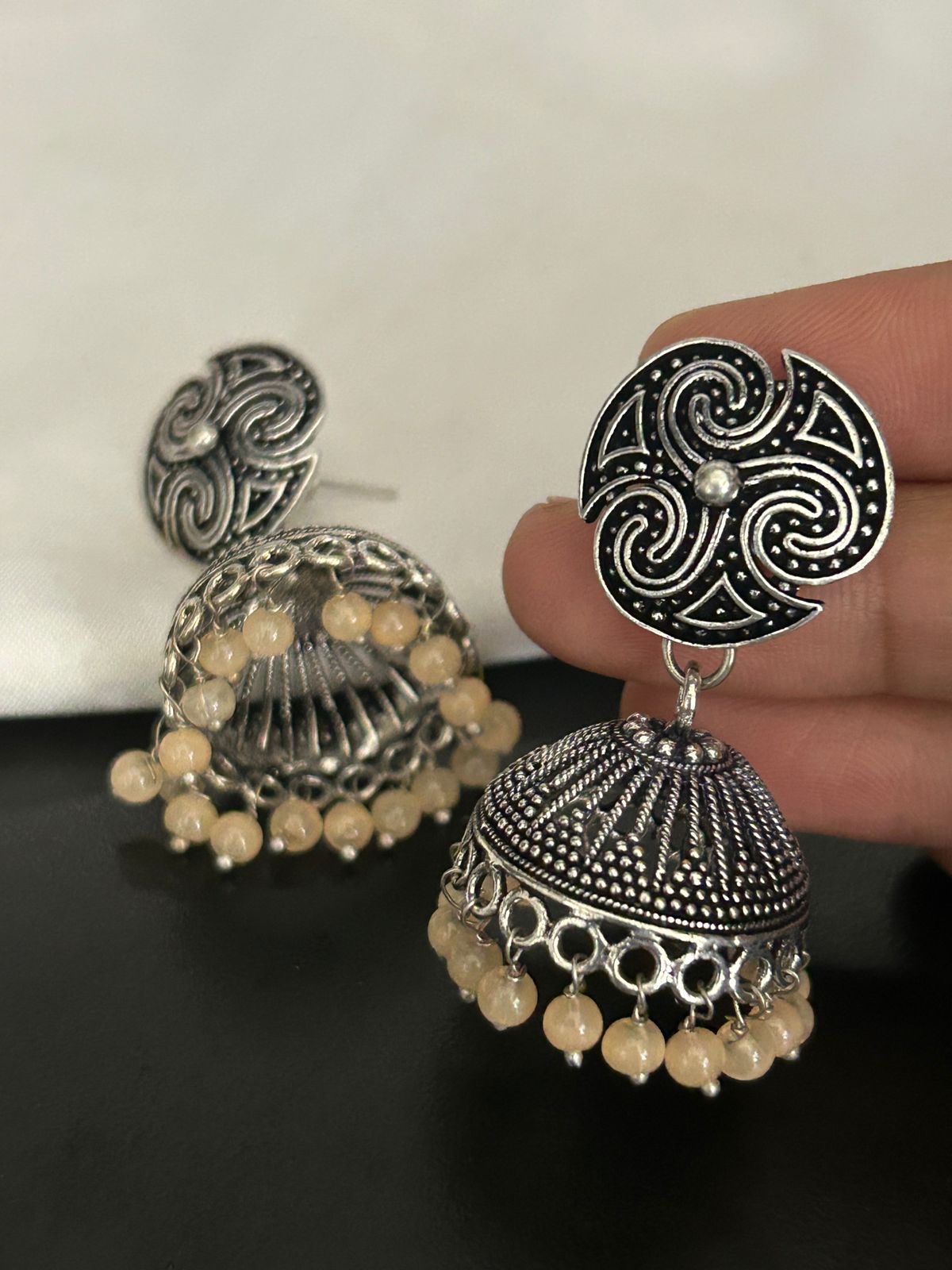 Oxidized Silver Jhumka Earrings with Beige Beads